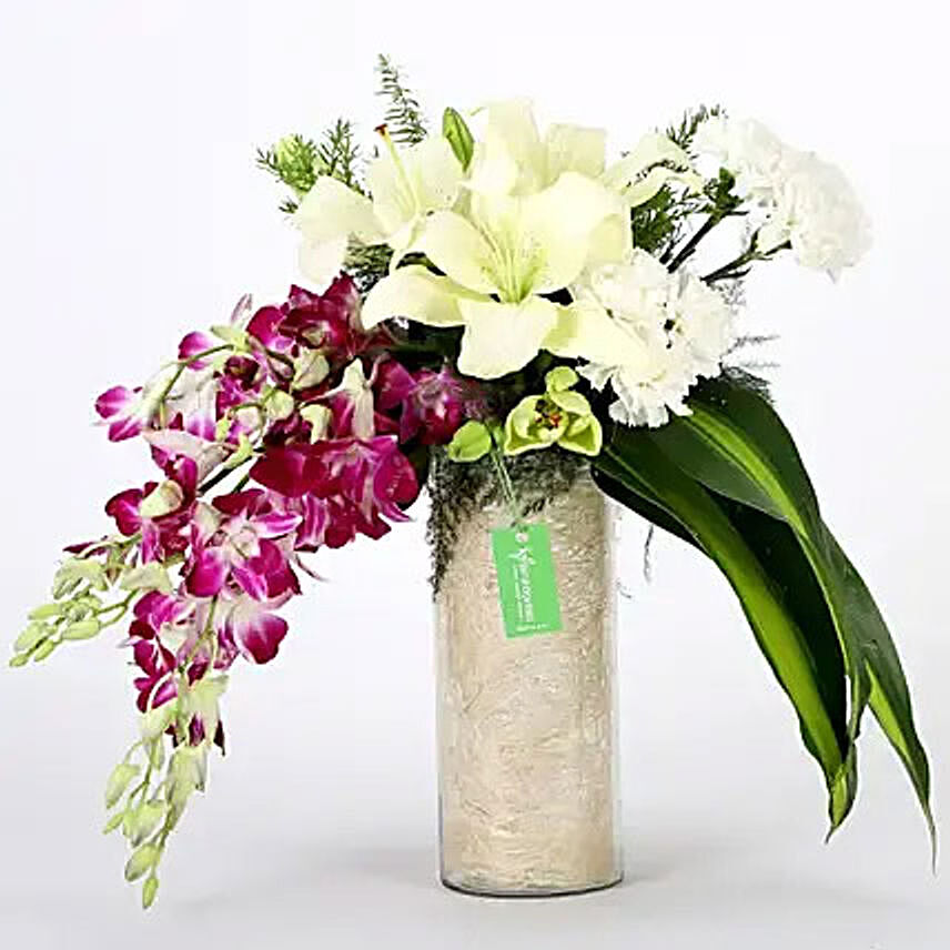 Orchids and Carnations Vase Arrangement: Flower Delivery to India