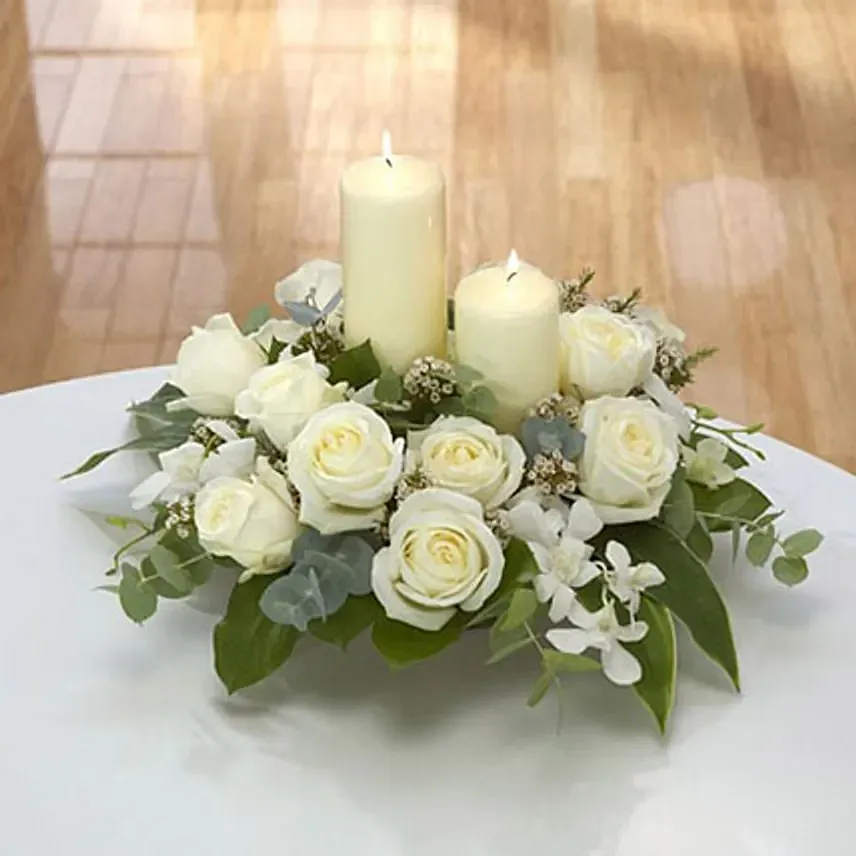 Center Table Arrangement: Funeral Flowers to Abu Dhabi