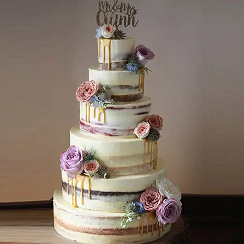 Beguiling 6 Tier Wedding Cake 14 Kg: Cake Delivery in Fujairah