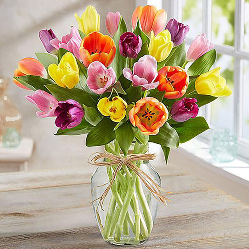 Colourful Tulips In Glass Vase: Anniversary Flower Arrangements