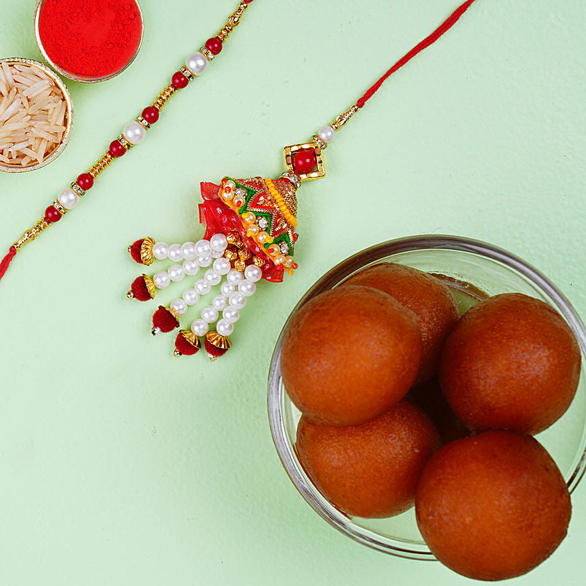 Designer Rakhi Set And Haldiram Gulab Jamun Tin: Rakhi
