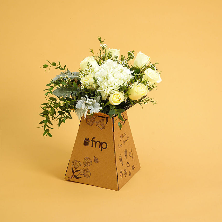 Wonderful Whites: Funeral Flowers to Ajman