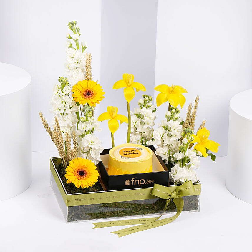 Celebration With Flowers and Cake: Graduation Flowers