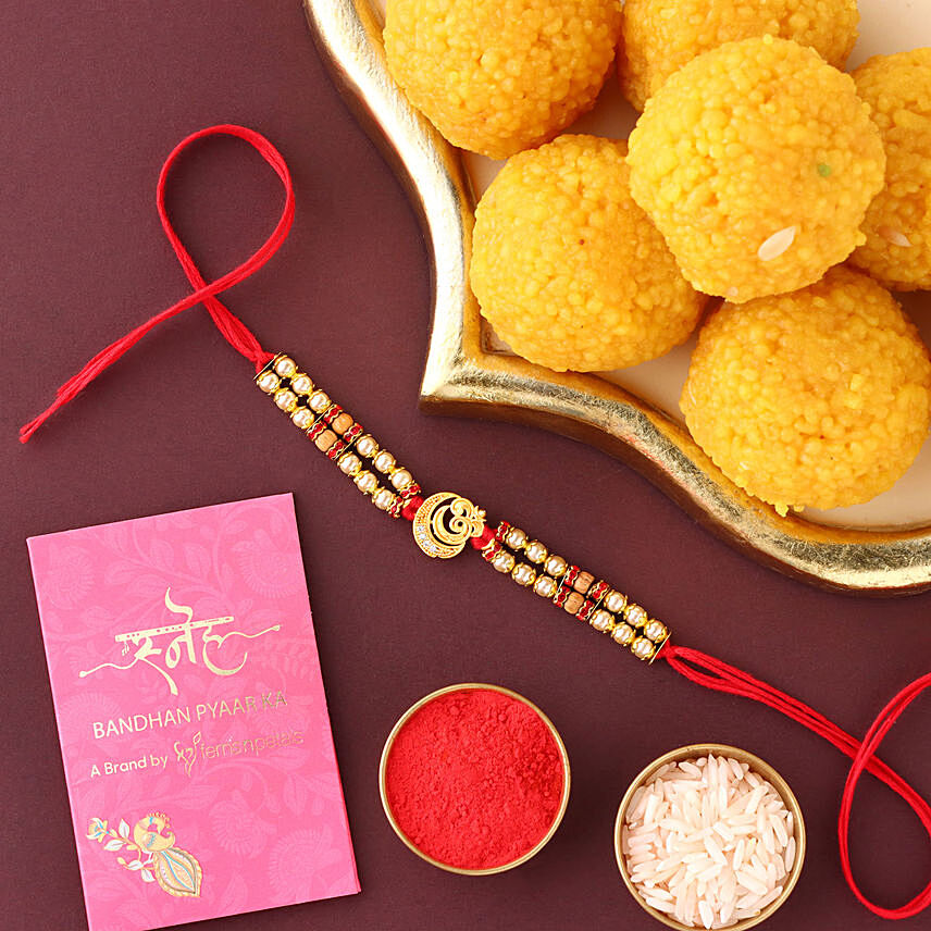 Sneh Graceful Om Rakhi & Motichoor Laddoos: Rakhi with Sweets