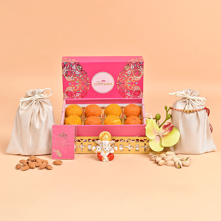Rakhi Ladoo and Ganesha Blessings Combo: Rakhi with Sweets 