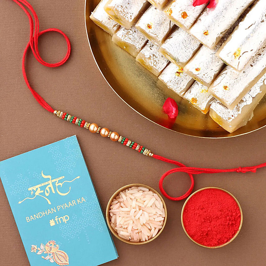 Sneh Gleaming Pearls Rakhi Set & Kaju Roll: Set of 3 Rakhi