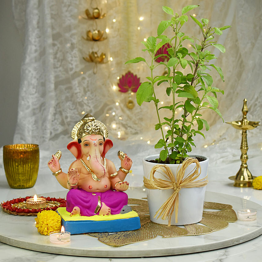 Ganesha Idol and Tulsi plant: Tulsi Plant 