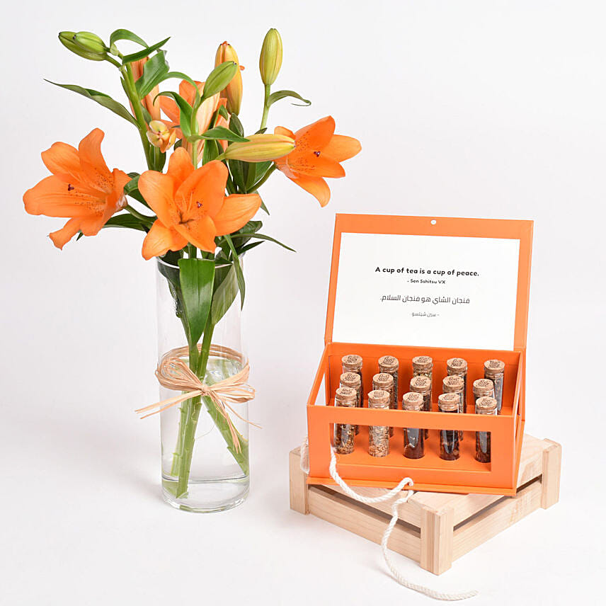 Orange Beauty Lilies and Premium tea: Cheerful Orthodox Easter Gifts