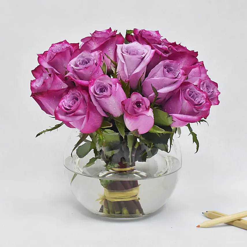 Purple Roses in Glass Bowl: 