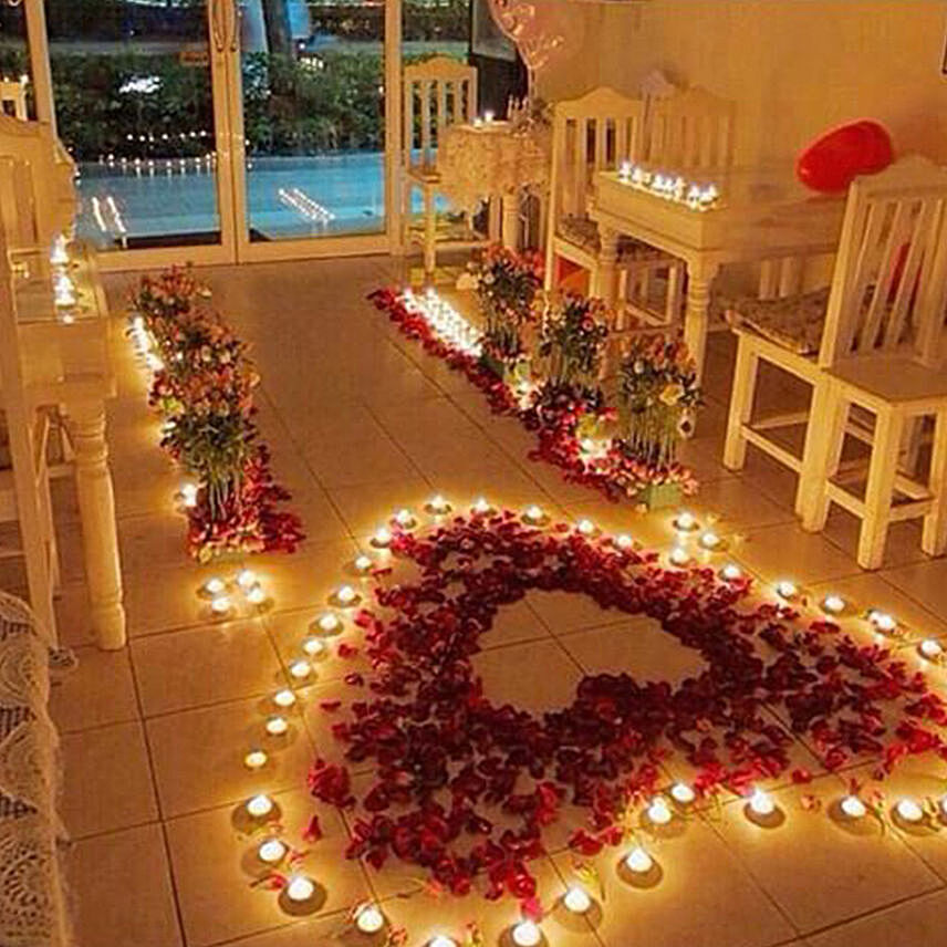 Romantic Roses and Candles Decorations: Flower Delivery In Ajman