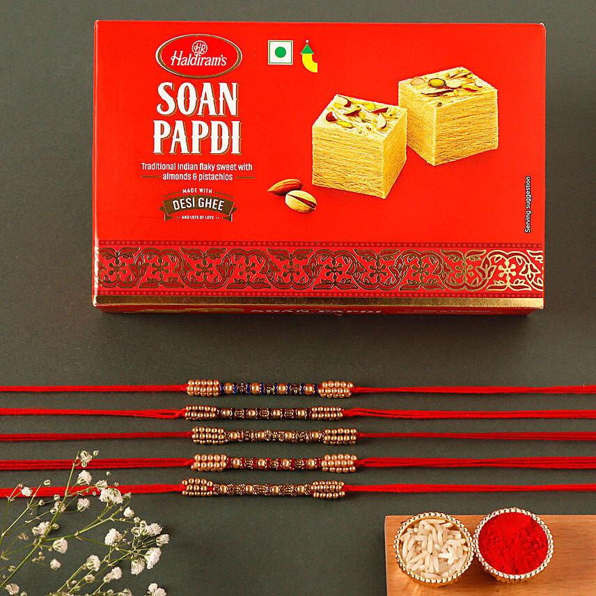 Sneh Colourful Pearl Rakhi Set with Soan Papdi: Order Rakhi in Sharjah