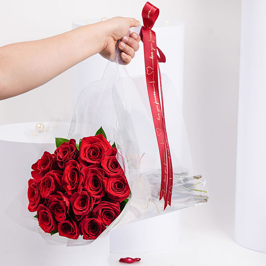 باقة 15 وردة جوري حمراء في غلاف شفاف هدية عيد الحب: 