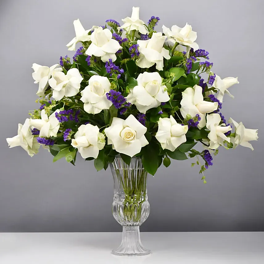 Beauty of White and Blue Flowers Vase: Gift Delivery Abu Dhabi