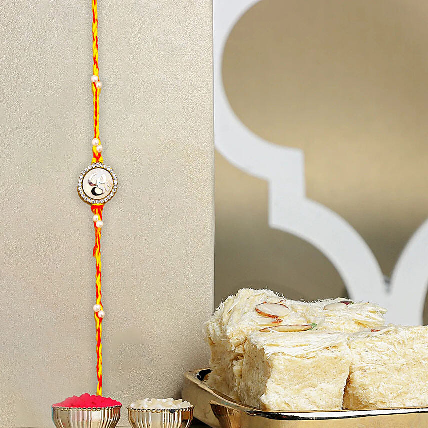 Mystic Om Essence N Soan Papdi: Rakhi with Sweets
