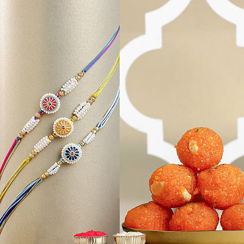 Floral Heritage Round Rakhi Set of 3 N Motichoor laddoo: Pearl Rakhi