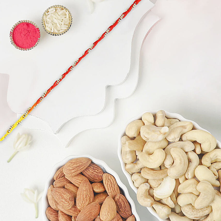 Sacred Beadwork Mauli Rakhi With Almonds and Cashew: Mauli Rakhi 