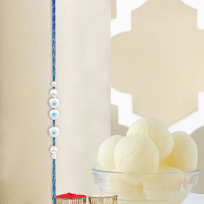 Simplistic Blue Evil Eye Rakhi N Rasgulla: Rakhi with Sweets