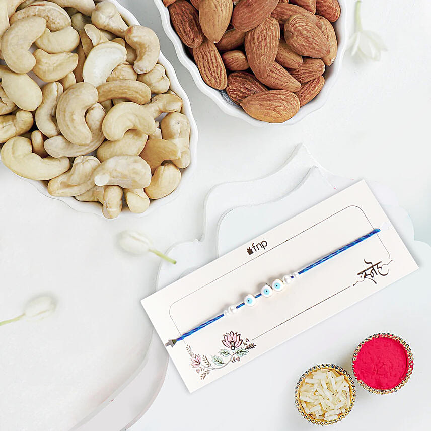 Simplistic Blue Evil Eye Rakhi With Almonds and Cashew: Pearl Rakhi