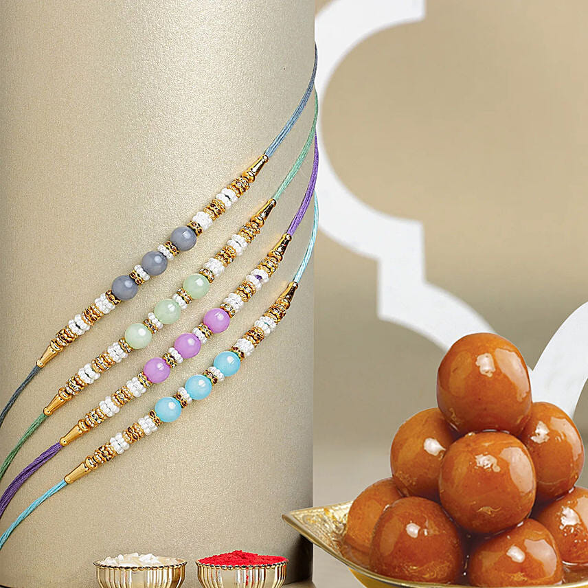 Zen Beadwork Rakhi N Gulab Jamun: Rakhi with Sweets