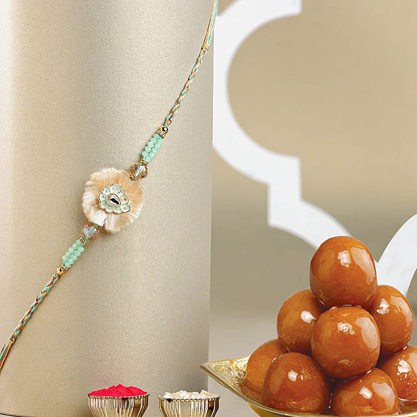 Artisan Affection Ethnic Rakhi N Delectable Barfi Bites: Rakhi with Sweets