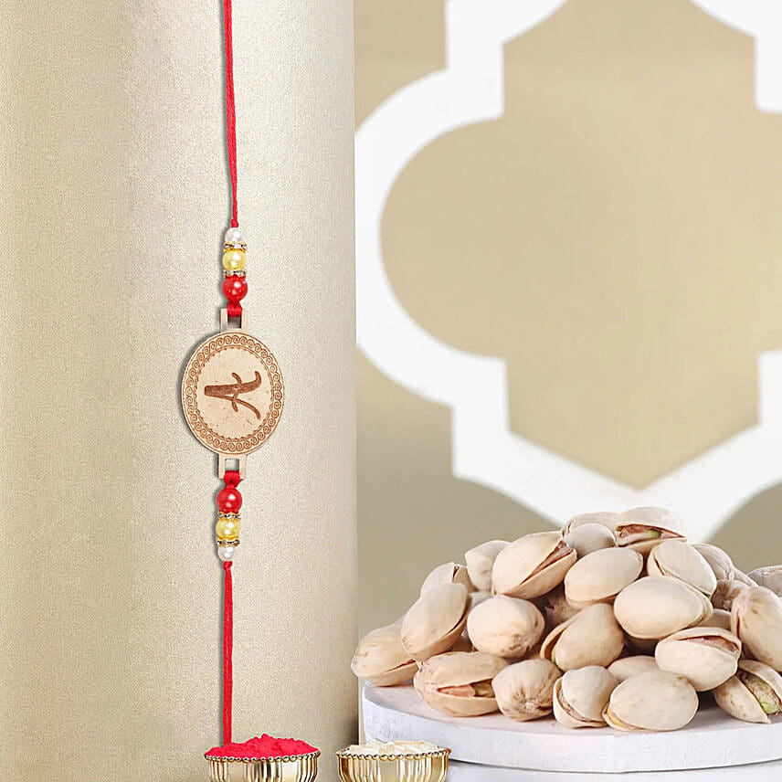 Sneh Personalised Small Oval Shaped Rakhi N Pistachio: Rakhi With Dryfruits