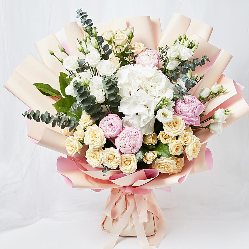 Ravishing Mixed Flowers Wrapped Bouquet: Send Gifts to Philippines