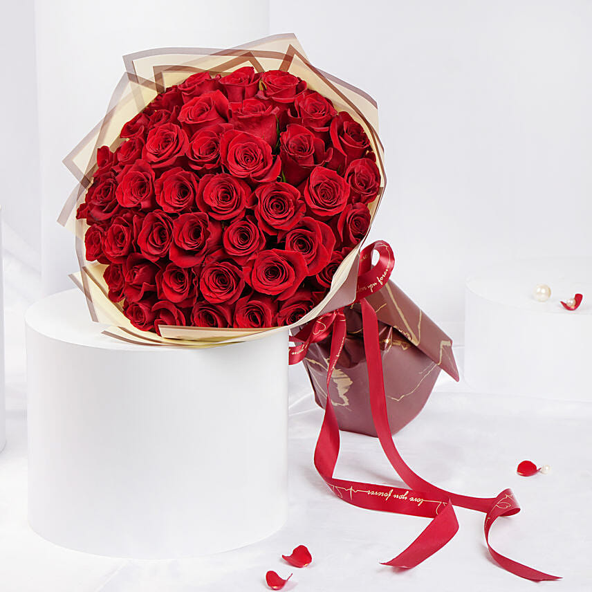 U & Me 50 Red Roses Bouquet: Send Gifts for Him To Qatar
