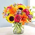 Vivid Bunch Of Flowers In Glass Vase