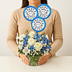 Blue and White Flower Arrangement With Balloons