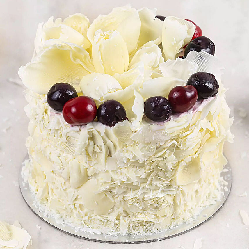 Heavenly White Forest Cake Half Kg: Send Birthday Cakes to Saudi Arabia