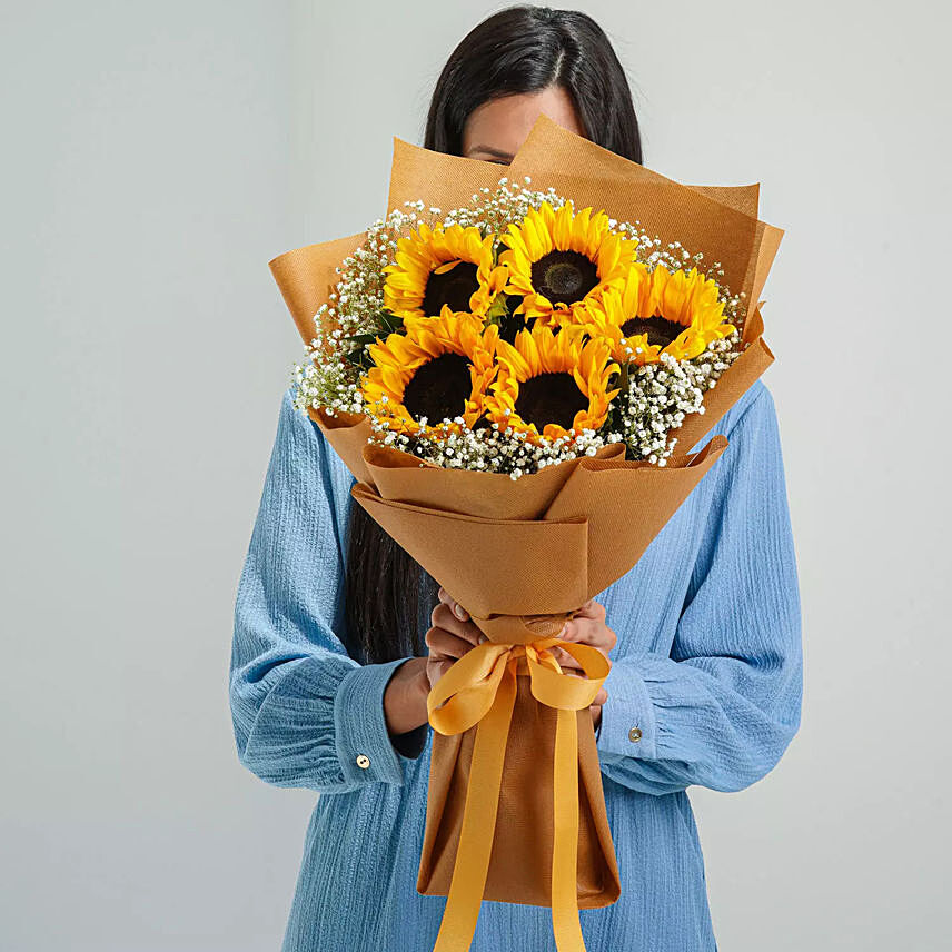 Ravishing Sunflowers Beautifully Tied Bouquet: Send Flowers to Saudi Arabia