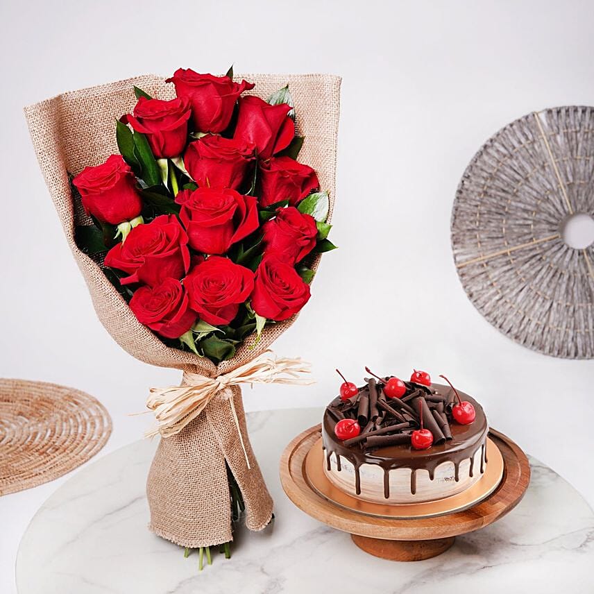 12 Red Roses Bouquet And Half Kg Chocolate Cake Combo: Saudi Arabia Gift Delivery