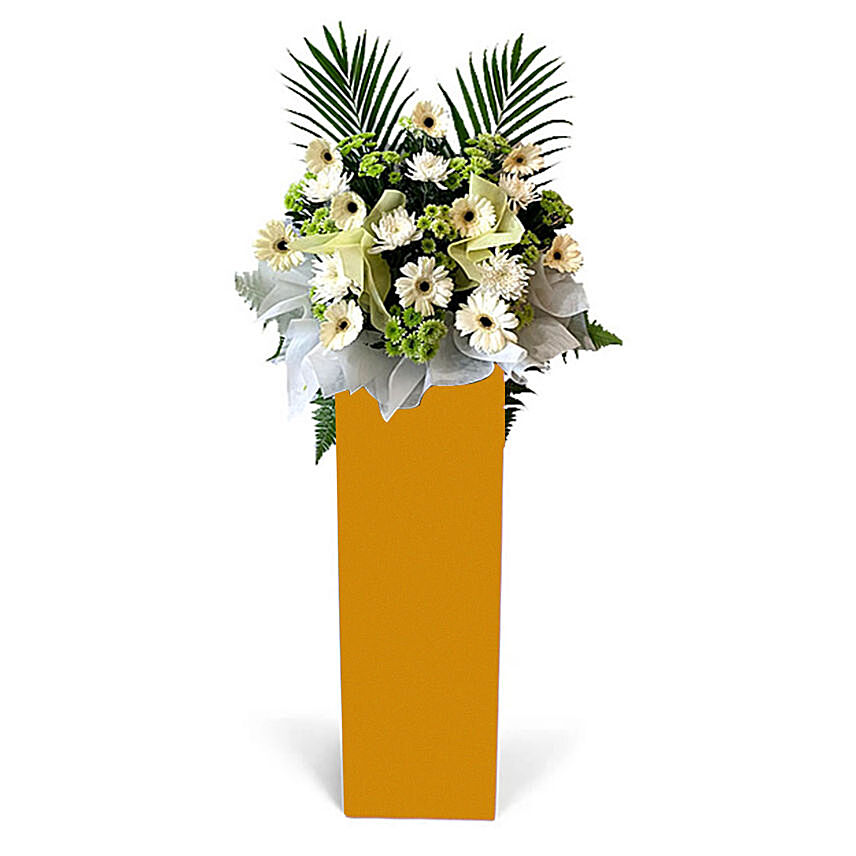 Alluring Mixed Flowers Arrangement In Brown Stand: 