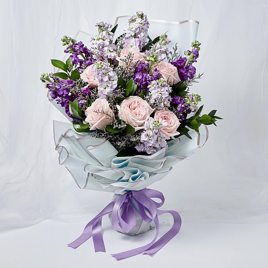 Elegant Mixed Flowers Wrapped Bunch: 
