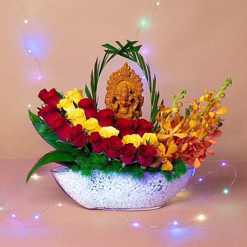 Colourful Flowers N Ganesha Idol Ship Shaped Vase: Send Diwali Gifts To Singapore