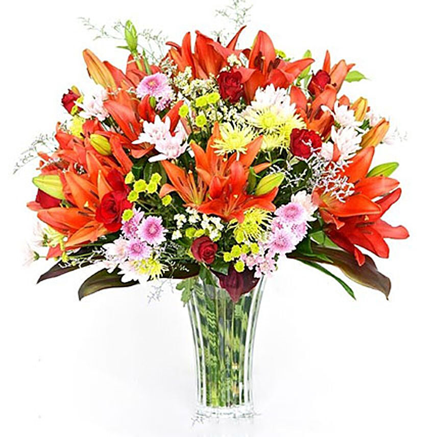 Radiant Lilies In Vase: Send Flowers To Sri Lanka