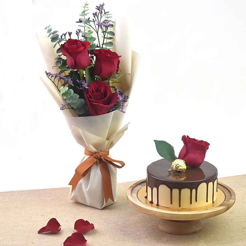 Half Kg Chocolate Delight Cake And Red Roses Bouquet Half Kg Chocolate Delight Cake And Red Roses Bouquet: Valentines Day Gifts to Bahrain