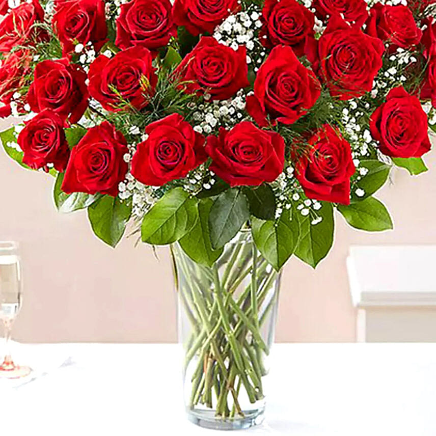 1 Kg Chocolaty Red Velvet Cake With 50 Roses Arrangement