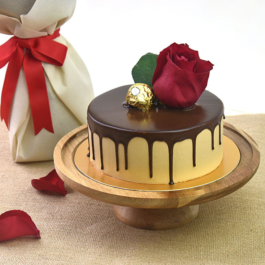 Half Kg Chocolate Delight Cake And 6 Red Roses Bouquet