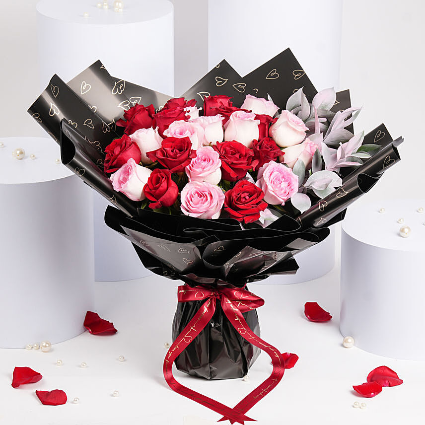 Online Valentine 12 Pink 12 Red Roses Bouquet Gift Delivery in Bahrain