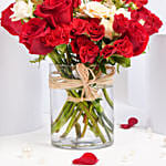 Red and Peach Roses in a Vase