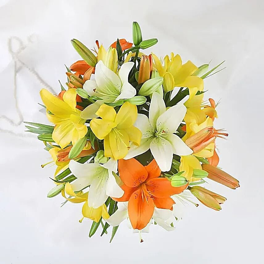 Fragrant Mix Of Lilies In Fishbowl Vase