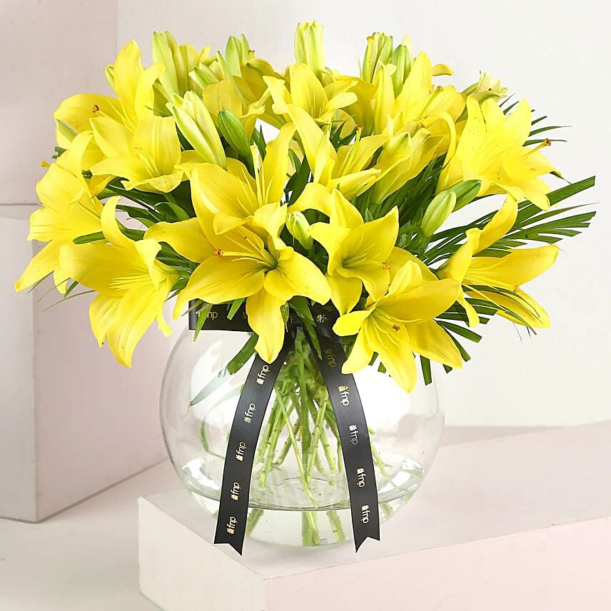Cheerful Yellow Lilies In Fishbowl Vase: Send Flowers To India
