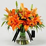 Blissful Orange Lilies In Fishbowl Vase