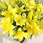 Cheerful Yellow Lilies In Fishbowl Vase