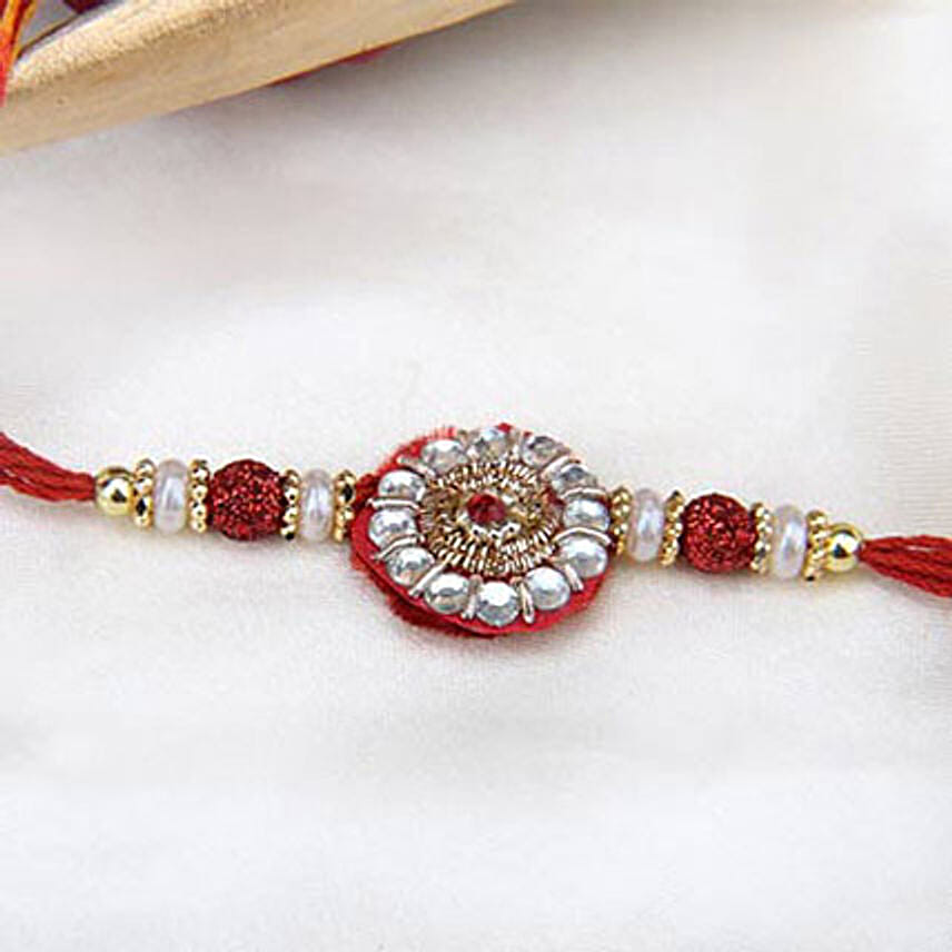 Red embellished rakhi for bro