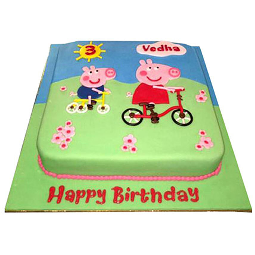 Peppa Pig on a cycle Cake