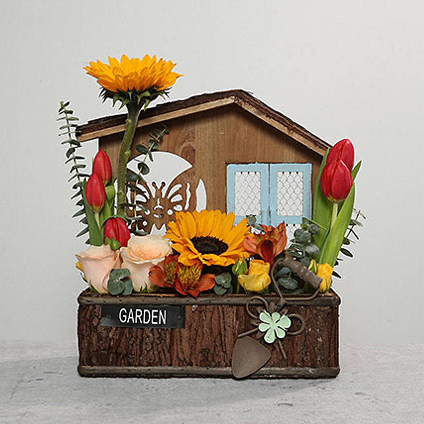 Mixed Flowers In Hut Shaped Base