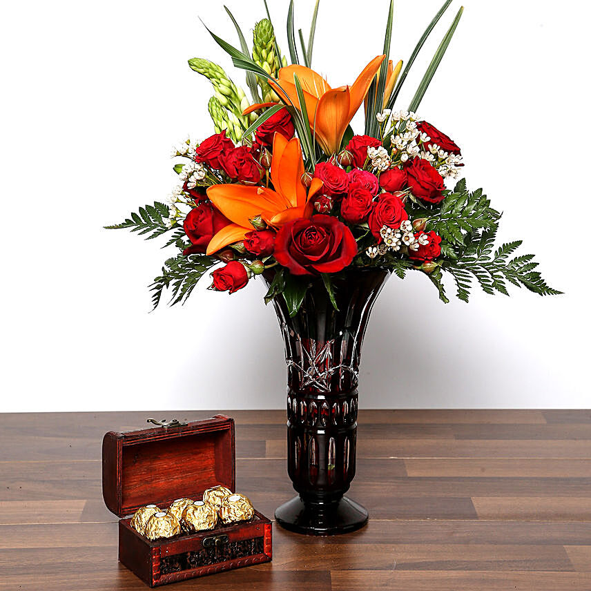 Asiatic Lilies and Roses In Vase With Chocolates