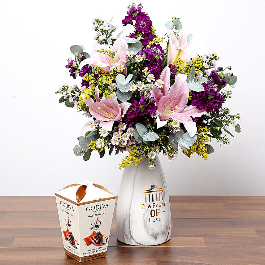 Pink and Purple Flowers In Vase With Truffles
